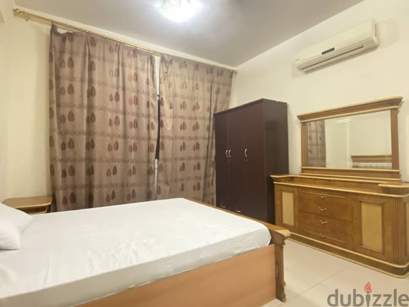 Fully Furnished spacious room with attached bathroom in Al Ghubra 2