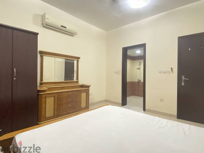 Fully Furnished spacious room with attached bathroom in Al Ghubra 3