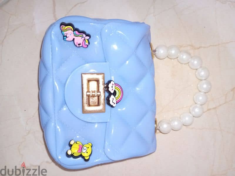 girls purse only 1 omr 1