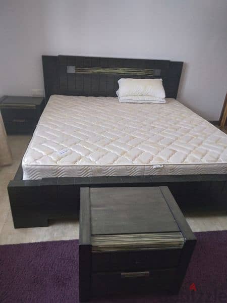 king size bed with dressing cupboard with two side tables 1
