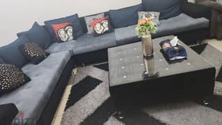 L shaped sofa ,centre table and carpet together cushions included 0