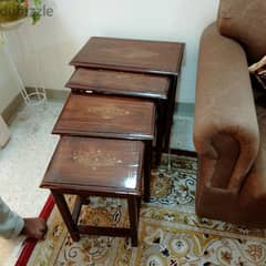 set of four carved wooden Nest tables