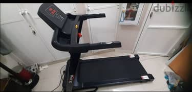 olypia motorised treadmill in good working condition