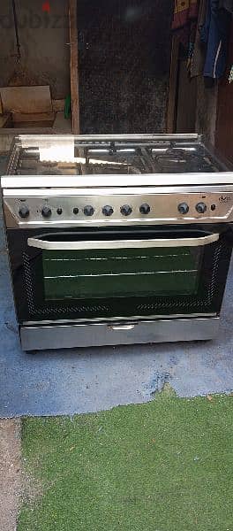 5 burner gas oven neat and clean excellent working condition 2