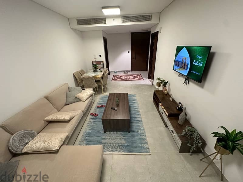 luxury furnished flat in muscat hills with swimming pool view 7