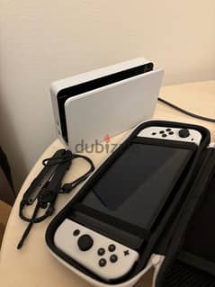 Nintendo OLED with 4 games and case and controller