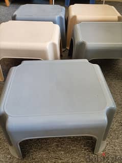 5 small plastic stools