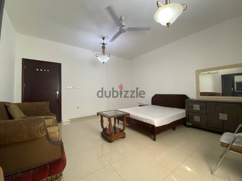 Fully Furnished spacious room with seperate washroom in Al Ghubra 1