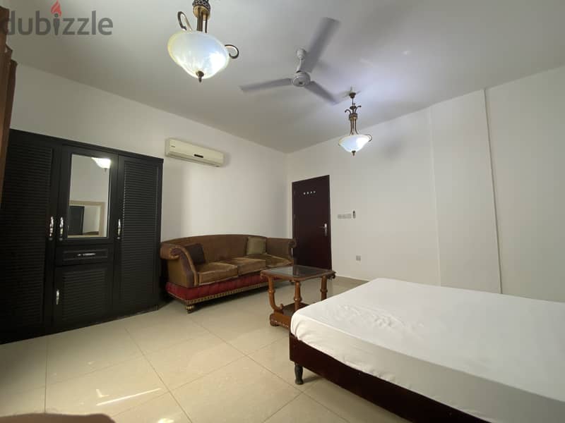 Fully Furnished spacious room with seperate washroom in Al Ghubra 2