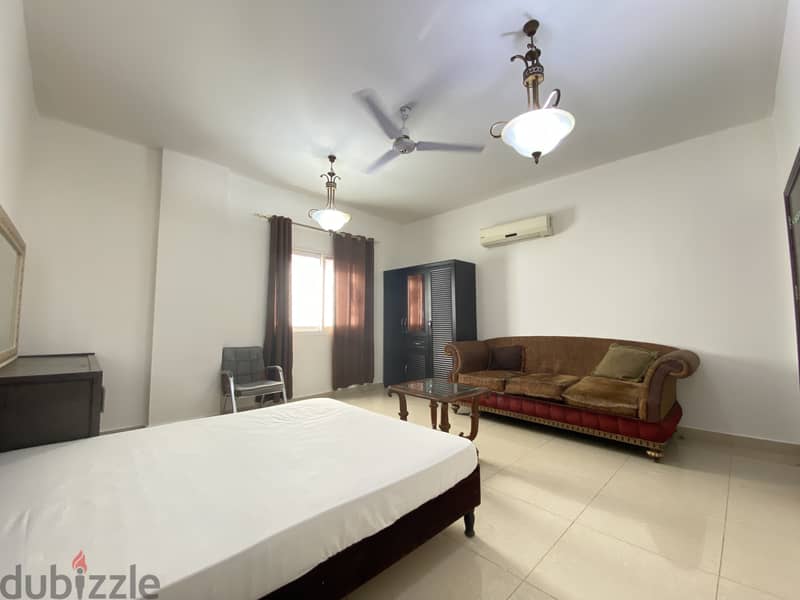 Fully Furnished spacious room with seperate washroom in Al Ghubra 3