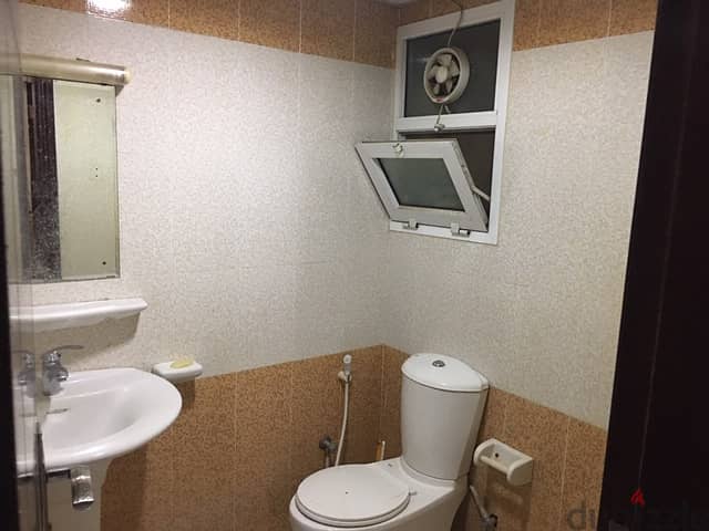 Fully Furnished spacious room with seperate washroom in Al Ghubra 4