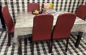 solid  dining table with 6chair good condition