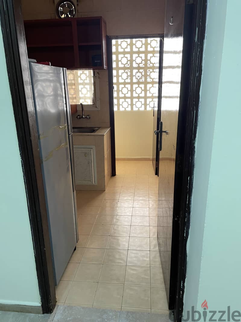 A Room with attached bath room ,sharing kitchen available in 2BHK flat 9