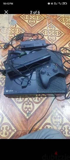 Xbox one with 2 disk games and camera and headphone all package 55 ro