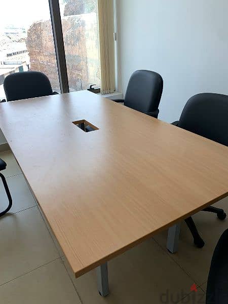 Meeting table with 7 chairs and 2 sofas available 1