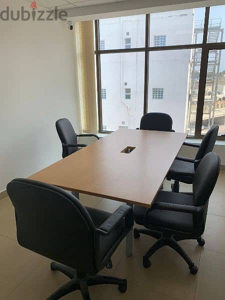 Meeting table with 7 chairs and 2 sofas available 8