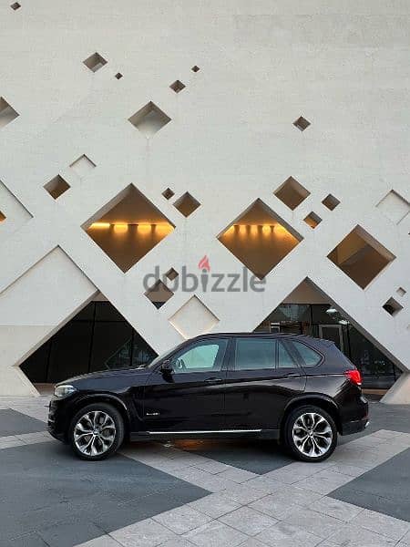 BMW X5 50i Xdrive 2014 7 seats Oman car 7