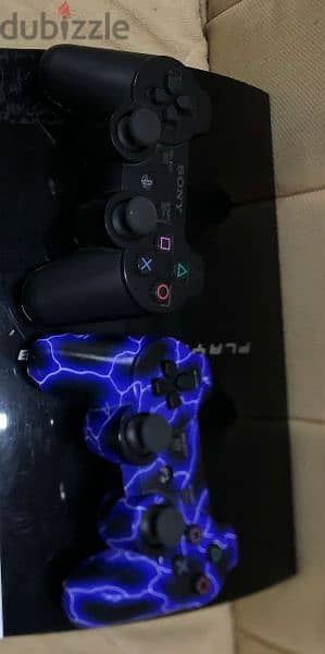 Playstation 3 with 2 controllers 500 gb and games don't waste 2