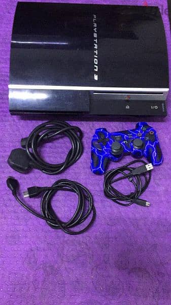 Playstation 3 with 2 controllers 500 gb and games don't waste 5