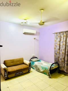 semi furnished room with attached toilet for rent