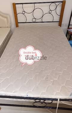 double bed with cot