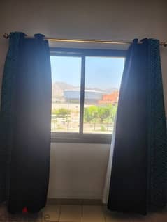 Green and blue curtains full window floor length