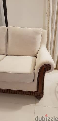 2 seater sofa beige color