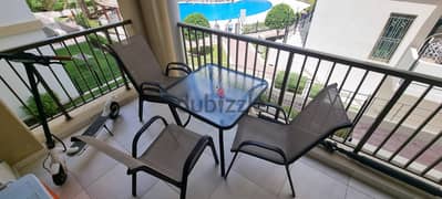 Garden or Balcony Dining table set with four chairs and umbrella