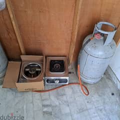 1 stove new and full gas cylinder