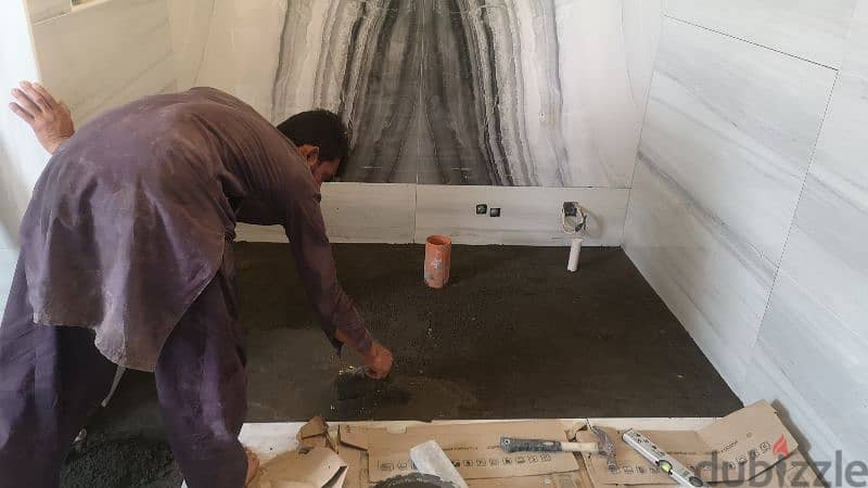 house maintenance working tiles and marble fixing and interlock fixing 2