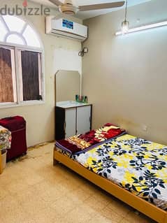 Executive bachelors furnished room is available with new split A. C.