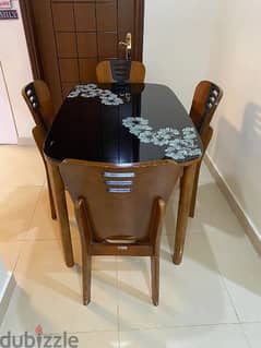 Dining Table Glass top with Fourwooden  Chairs