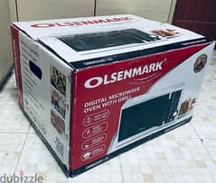 Olsenmark brand new non used microwave oven 23 ltr with warranty
