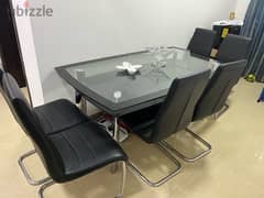 Dinning table with 6 nos leather chair