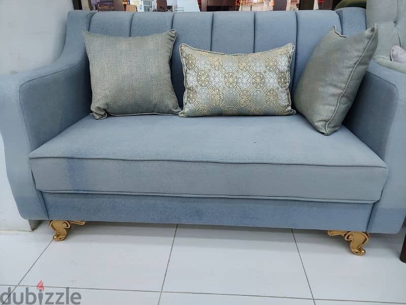2 seater sofa without delivery 1 piece 40 rial 1
