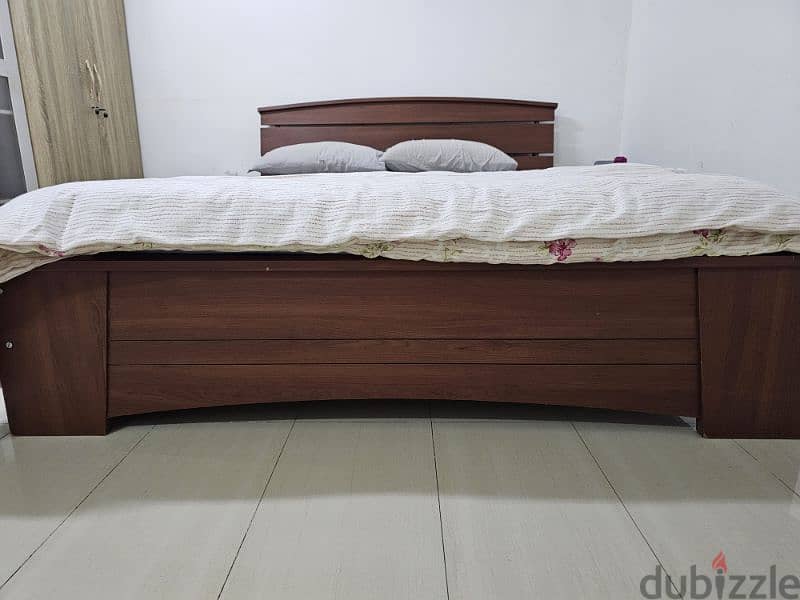 king-size bed with two side tables 1