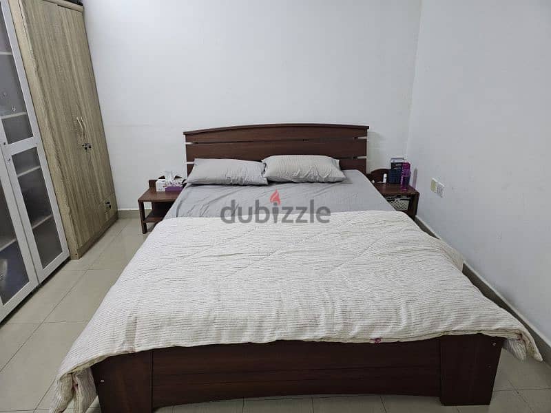 king-size bed with two side tables 2