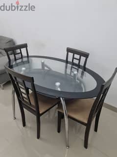 Glass Dining  table  with  four chair