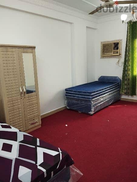 bed space neat and clean with kitchen and WiFi near Al ghubrah 1