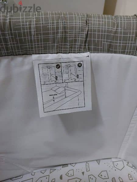 baby crib can be attached to bed 3