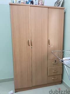 Wooden 3 door cupboard 0