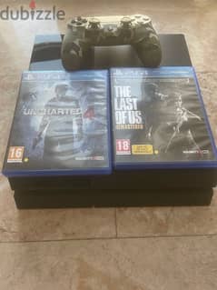 ps4, two cd’s and a controller