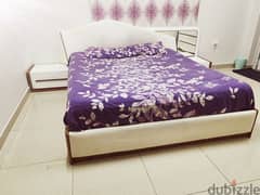bed with side tabels and mattress