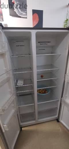 2 years old refrigerator like new and good condition 700 liter