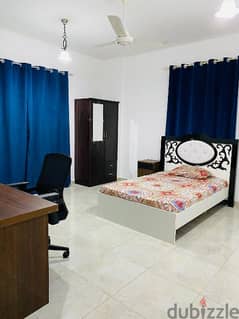 well furnished bedroom with attached bathroom in Ghubra