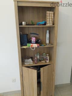 book shelf with cupboard