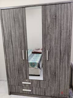 Two, 3 Door Cupboards with a Mirror available