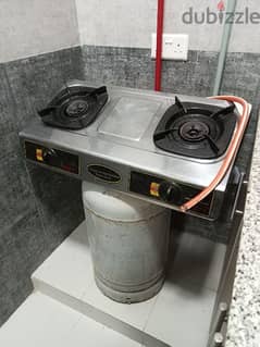 Gas cylinder with gas cooker