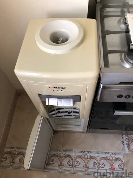 Water dispenser with fridge for sale برادة ماء مع ثلاجة للبيع 1
