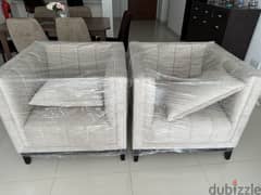 2 Brand new single seater sofas
